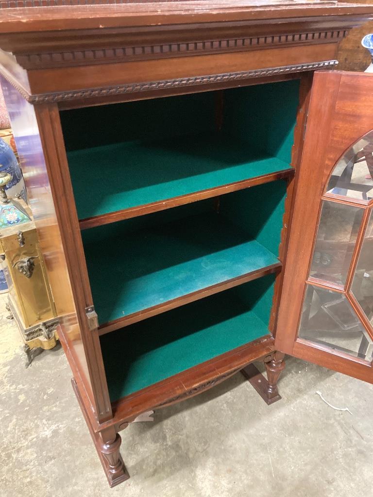 A mahogany cabinet stamped 'Admiral's day cabin 425', width 63cm, depth 42cm, height 115cm